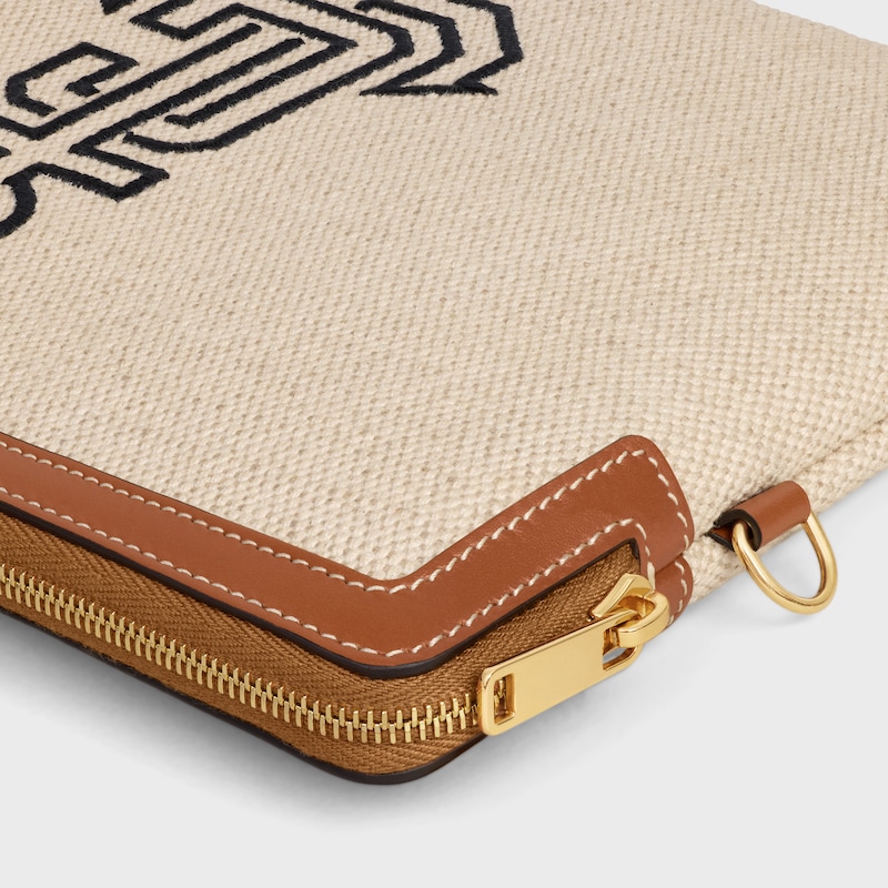 kleine tasche mit trageriemen aus textil mit ankerstickerei und kalbsleder