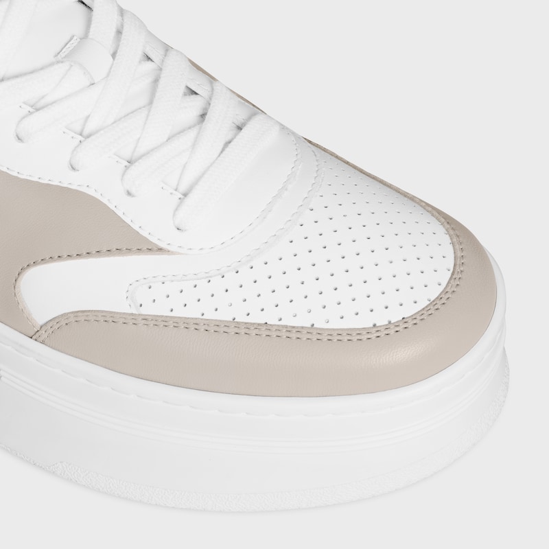 celine - block sneaker mit triomphe-motiven aus kalbsleder