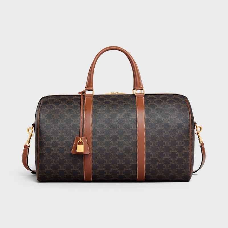 mittelgroße reisetasche aus triumphe canvas und kalbsleder