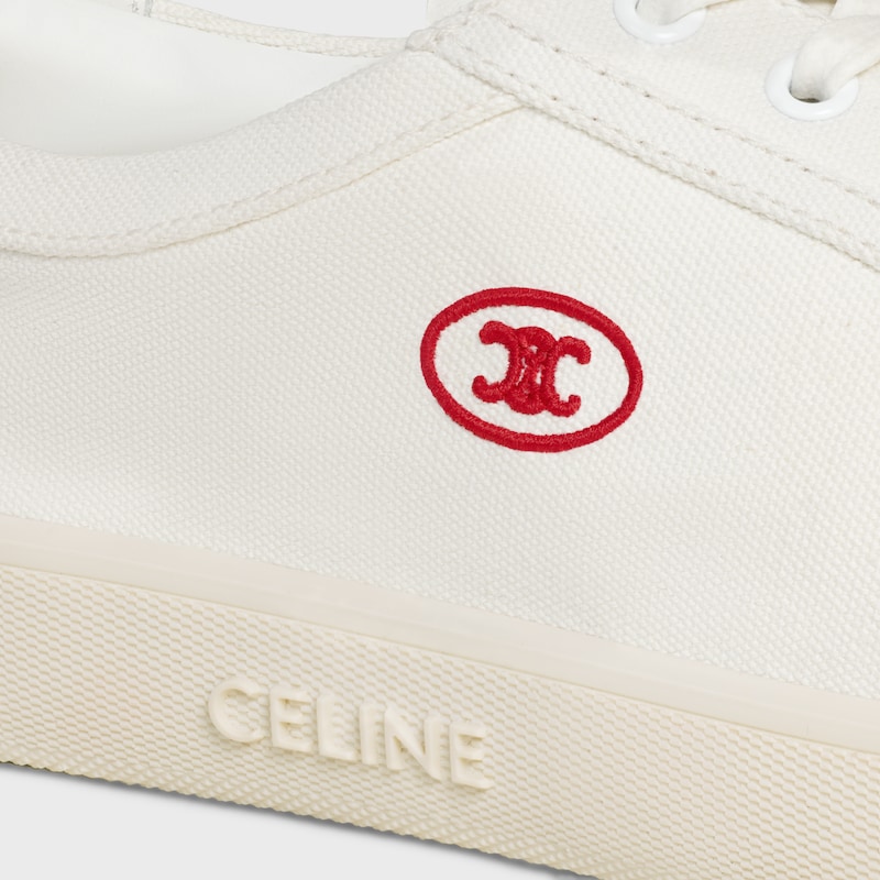 celine lou low schnÜrsneaker mit gesticktem triomphe-modus aus canvas und kalbsleder